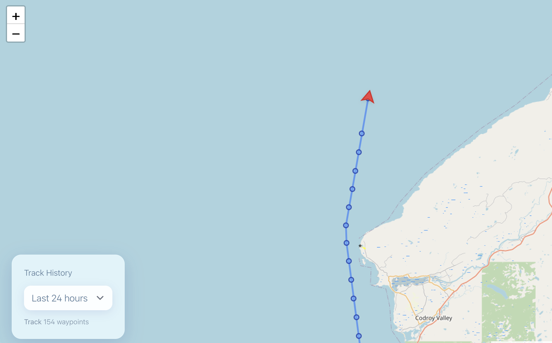 Vessel Tracker showing real-time vessel position with track history along the coastline